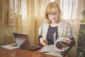 Menopause at work: menopausal woman working from home
